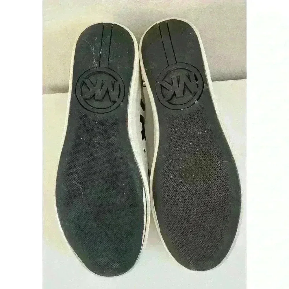 Michael Kors leather sneakers logo wrap around size. 7M  patent leather on back